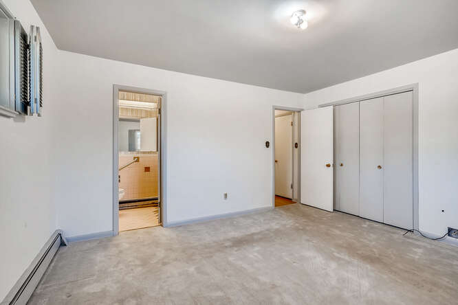 2787 S Langley Ct Denver CO-small-015-015-Primary Bedroom-666x444-72dpi